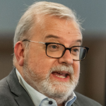 Headshot of Professor Andrew Curran delivering a seminar at the PROTECT conference