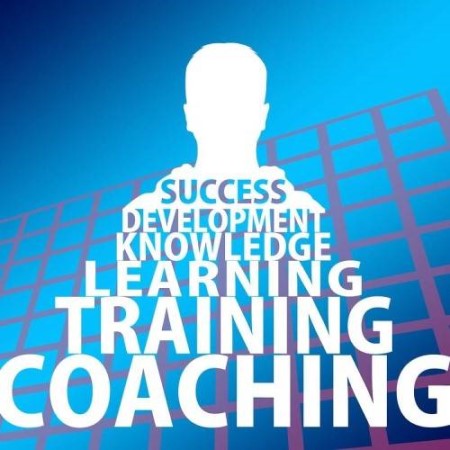 blue square with words training, coaching, learning, knowledge, development and success written in white text